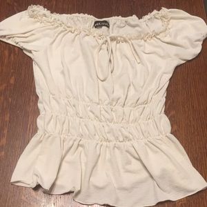 A white off the shoulder blouse